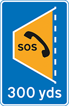 Blue motorway sign with an orange SOS telephone symbol and the text '300 yds' indicating the distance to the next emergency area